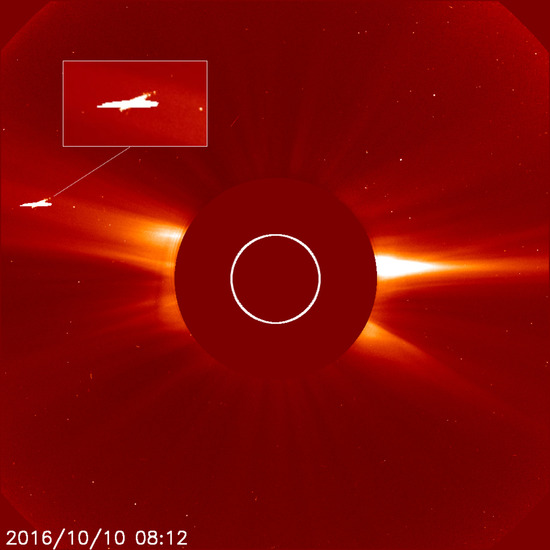 Описание: Share International November 2016 images, A winged figure was photographed near the sun by NASA’s Solar Heliospheric Observatory (SOHO) on 10 October 2016.